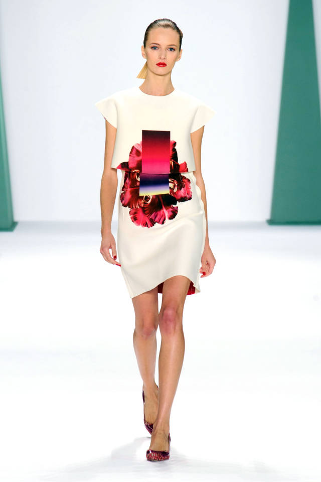 Carolina Herrera This unexpected graphic flower print is fantastic! I love the cream backdrop and bold co lor pairing. It’s just lovely.