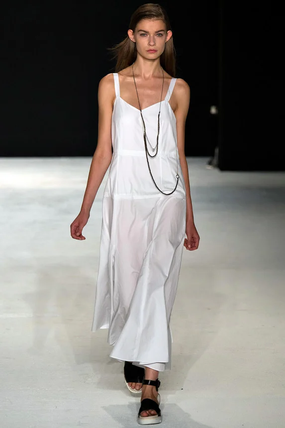 Rag & Bone The simplicity of Rag & Bone is always appealing to me, and this long, white dress is no exception. Plus, the black accessories are a perfect touch!