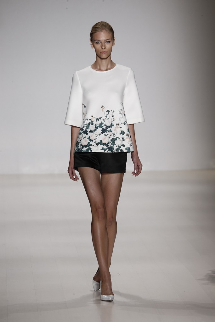 Erin Fetherson There is something so sexy about a black short with pumps. While much runway fashion tends to be the opposite of versatile, these shorts would match with anything, including this pretty floral top.