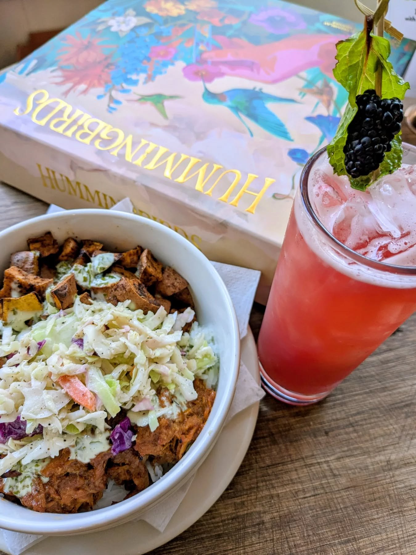 This month's special is a BBQ pork and sweet potato rice bowl with cilantro lime crema and slaw! Also, this Hummingbird game is wild. Takes 15 minutes to play. Super weird good warmup game. Grab it off of the staff picks!