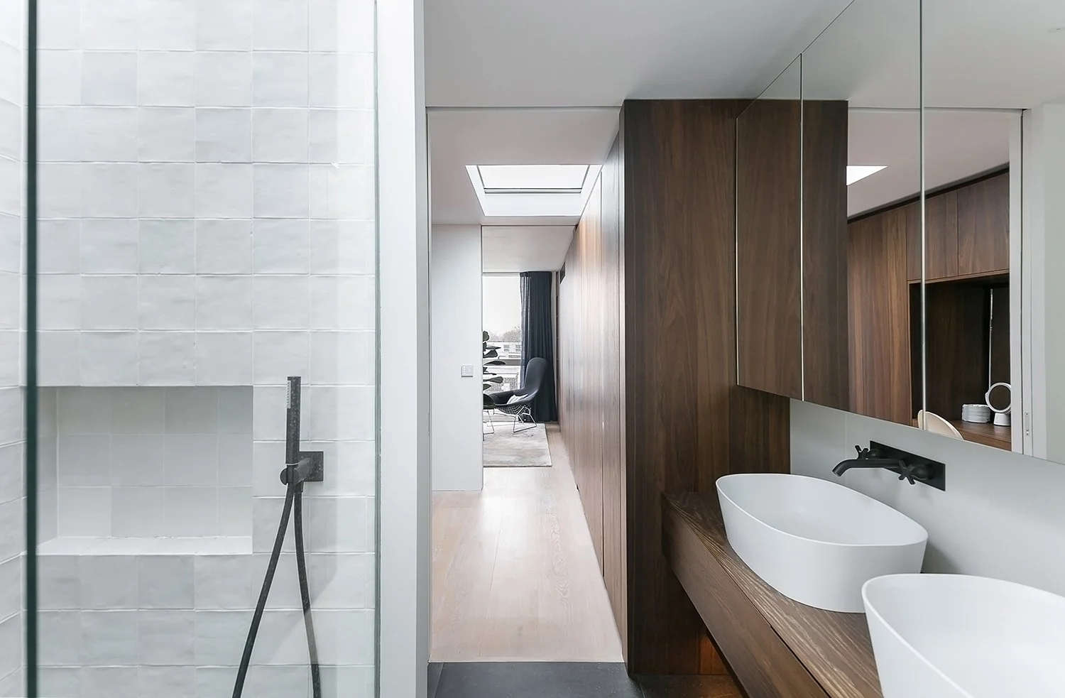 WilliamTozerAssociates_StructuralistEstates17_master-bedroom-timber-wardrobe-ensuite.jpg