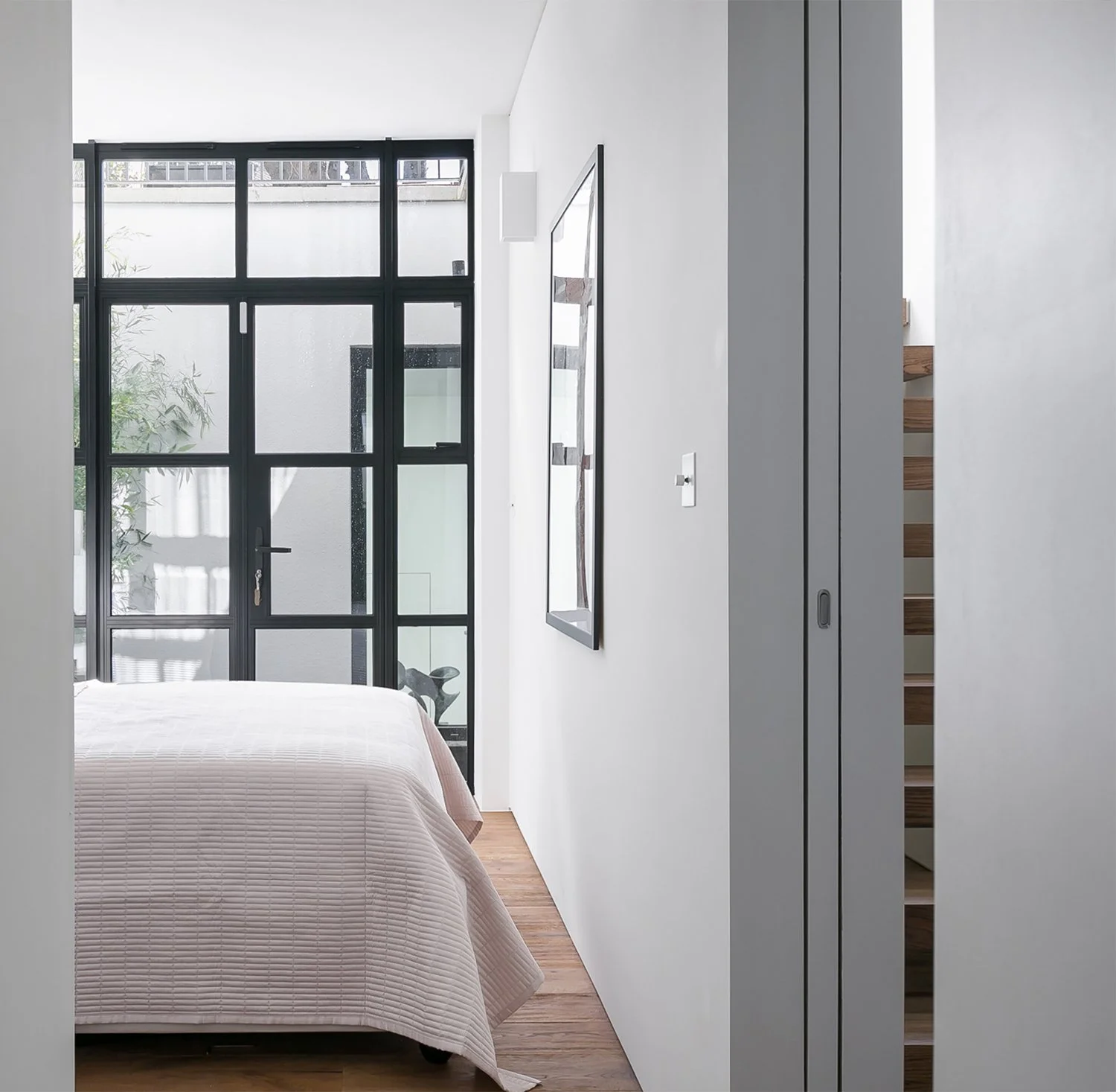 Monument House 08_Williamtozerassociates_basement-lightwell-pocekt-door-crital.jpg