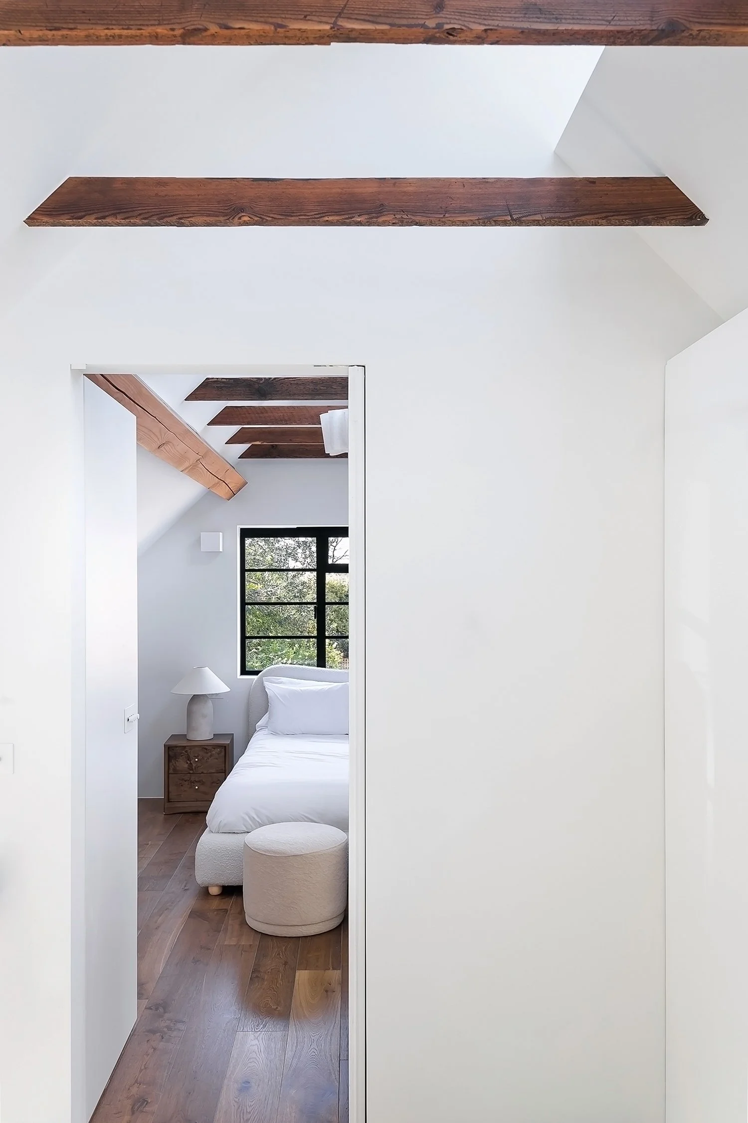 Monument House 13_Williamtozerassociates_bedroom-exposed-joists-pitched-roof.jpg
