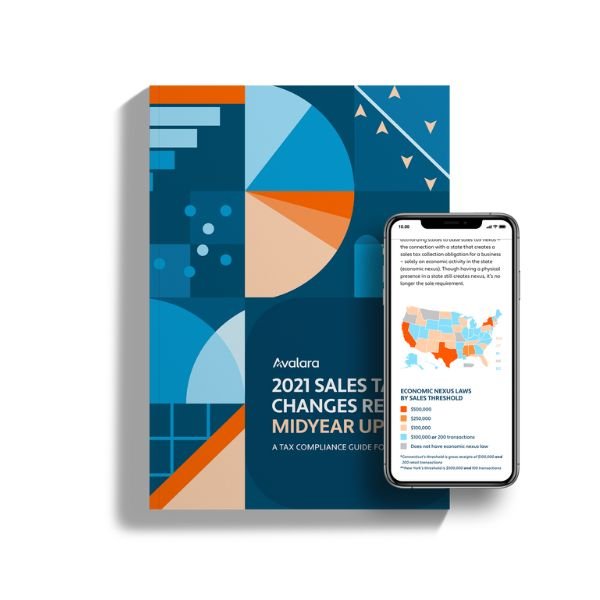 Cover of a book titled '2021 Sales Tax Changes Review Midyear Update' with a colorful geometric design, placed next to a smartphone displaying a U.S. map and sales threshold information.