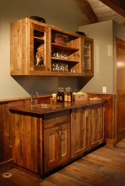 Grandmas Attic softwoods crafted into bar and cabinetry for the game room.