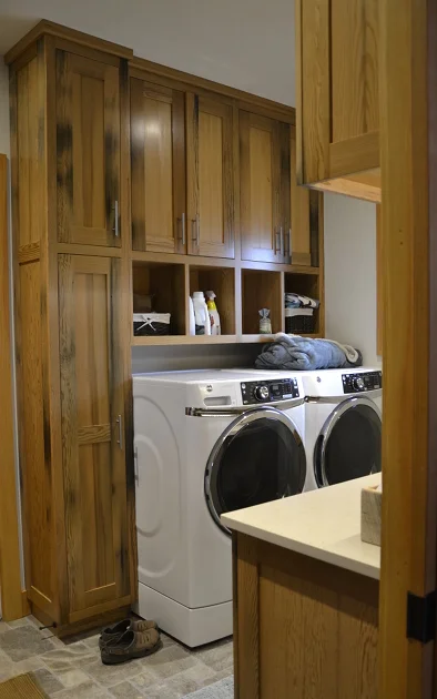 Laundry Room Cabinetry Made of Reclaimed Pickle Vat