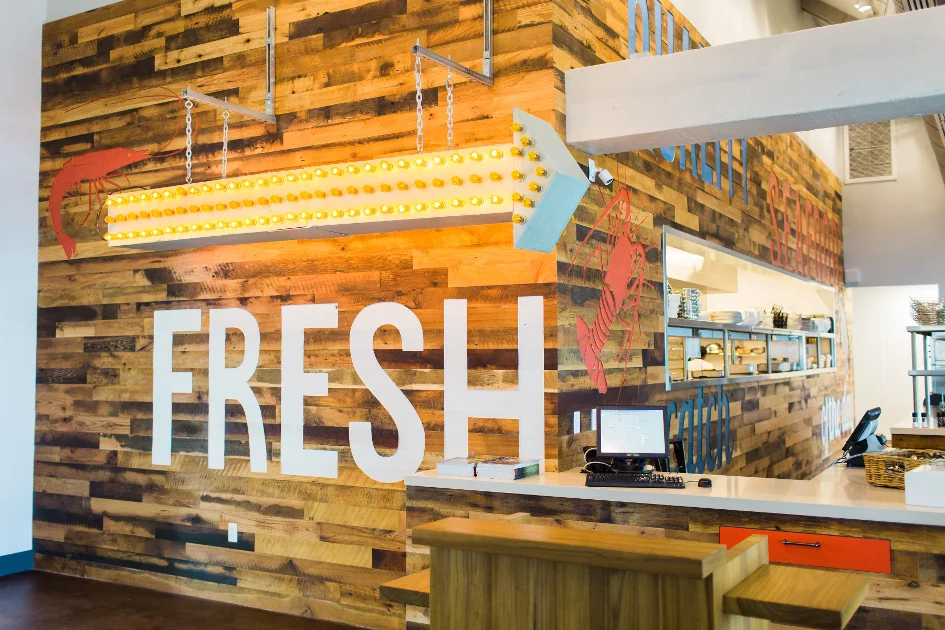 We CNC'd wording and more on Pioneer Millworks Settlers' Plank Reclaimed wood panes for Angler and Ales in Florida
