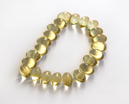 Vitamin D capsules forming the letter D - Ultimate Health Personal Trainer Toluca Lake