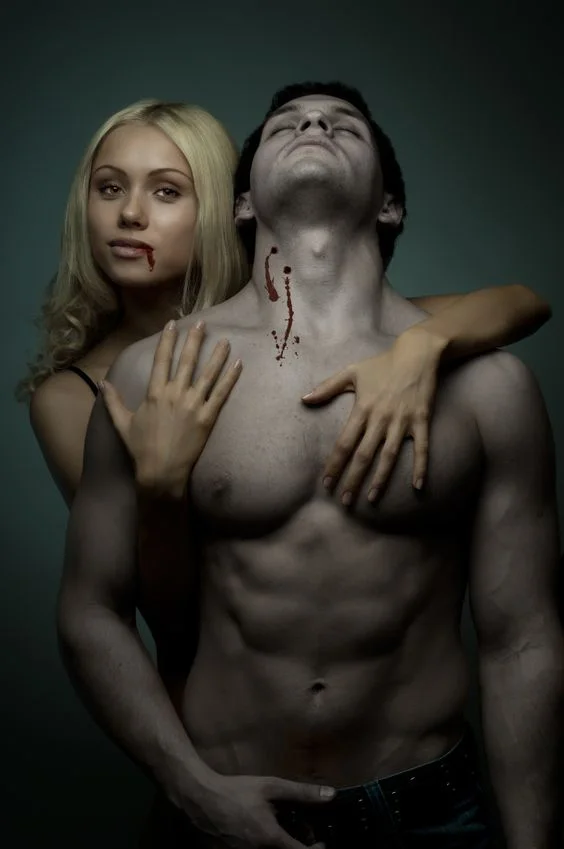 Female Vampire with fit male victim. Ultimate Health Personal Training Center Hollywood, CA.