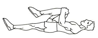 Man stretching on back - knee to chest - Ultimate Health Personal TrainingCenter