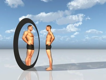 skinny man looking in mirror at muscular self.