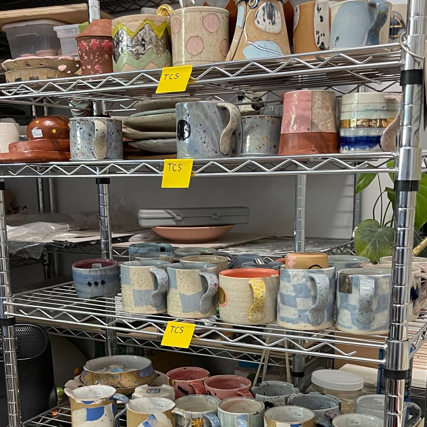 Above: Wire rack full of finished work.  I use Post-It Notes when I’m organizing pots to ship to galleries/shops (TCS is The Clay Studio of Philly). 