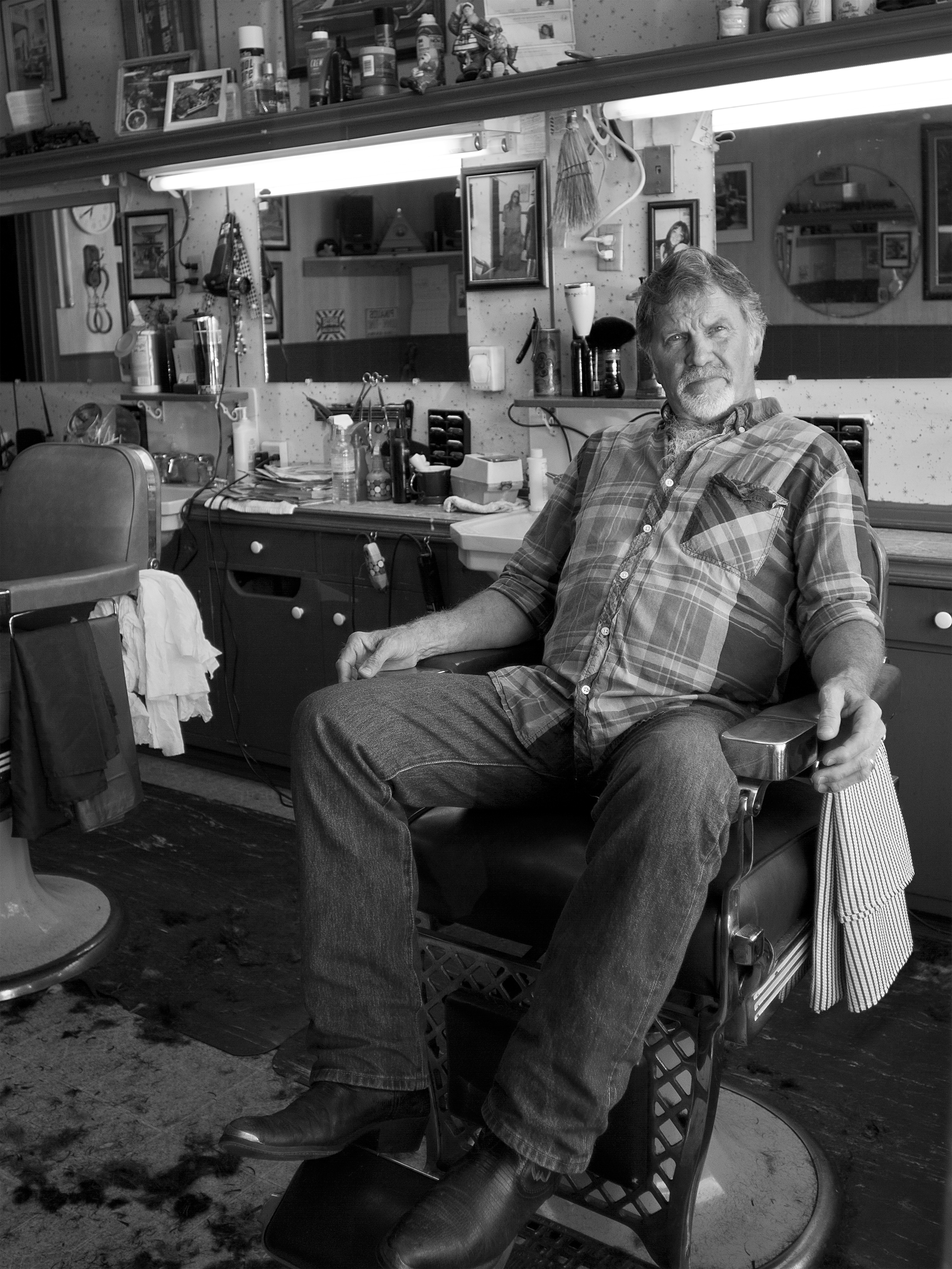  Mike. Head barber/owner of Sandy's Barber Shop. Bainbridge Island.&nbsp; 
