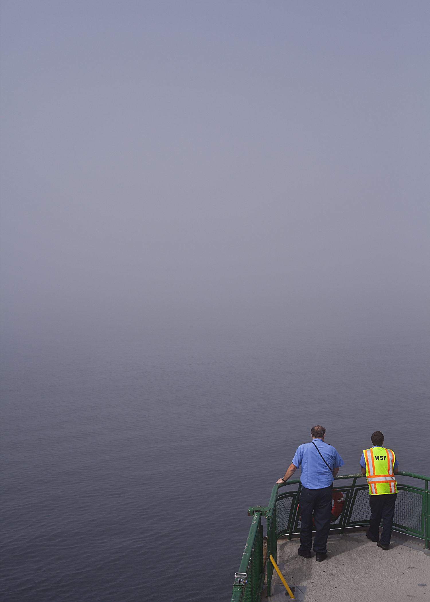 Extreme fog slows the passage of the Washington State ferry during an afternoon sailing from Seattle to Bainbridge Island. 