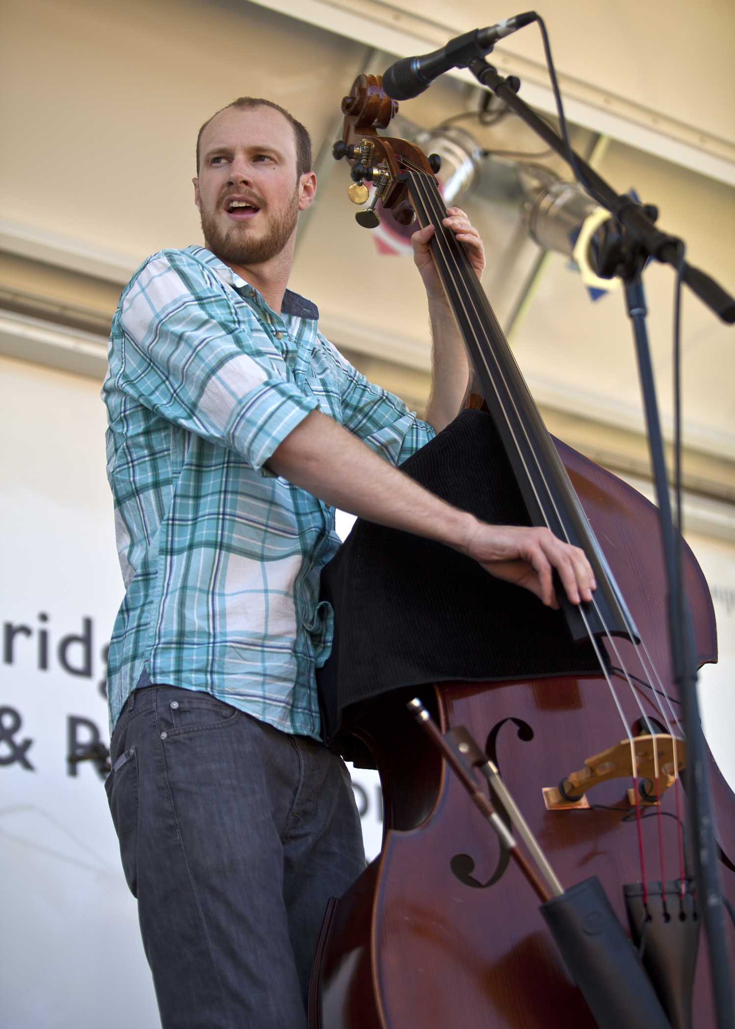  Andrew Knapp, bass player of the Warren G. Hardings, at the 2013 Bainbridge Island Bluegrass Festival.&nbsp; 