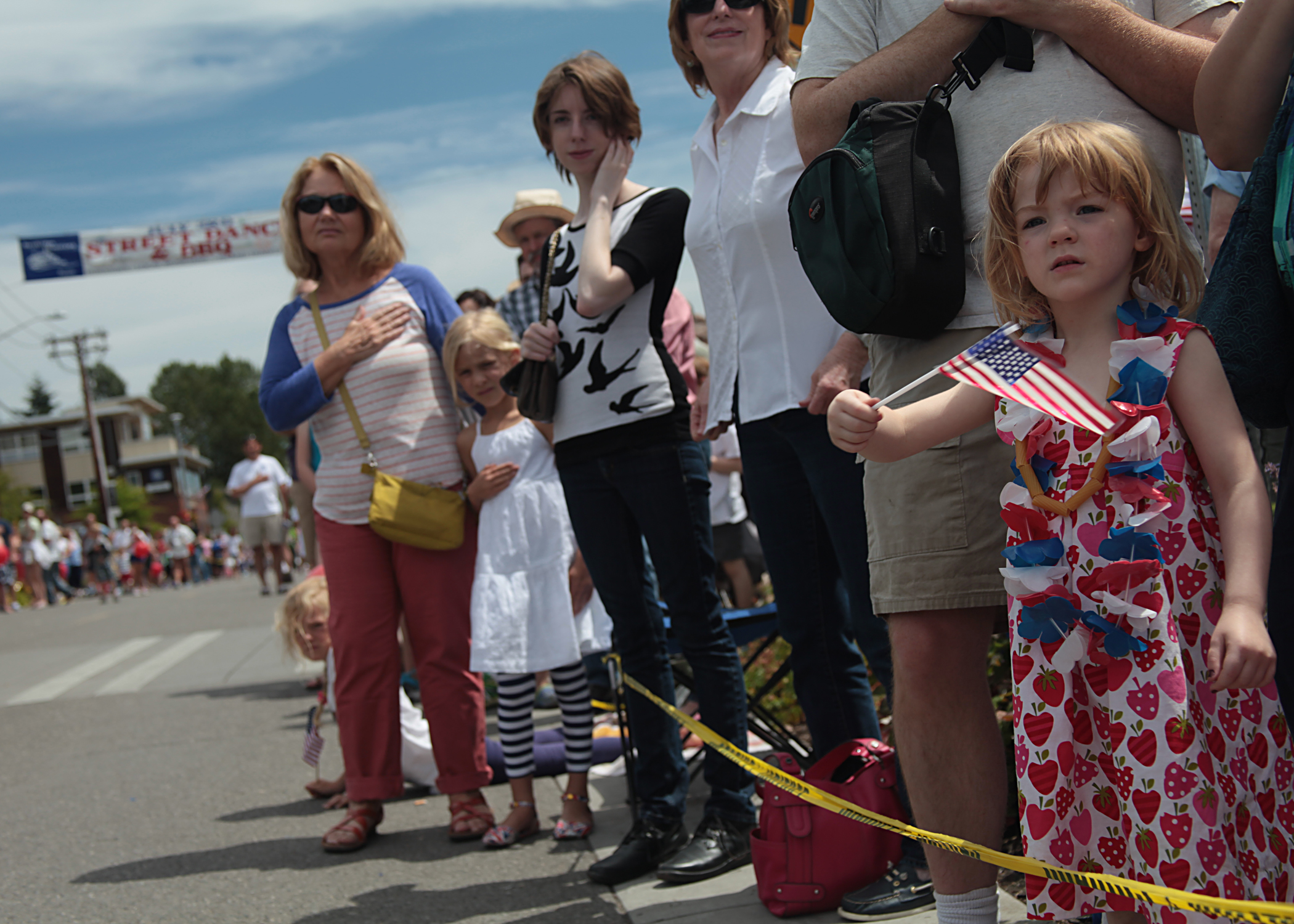 A crowd lines the streets of downtown Winslow just prior to the start of the 2014 Grand Old Fourth of July parade on Bainbridge Island. 