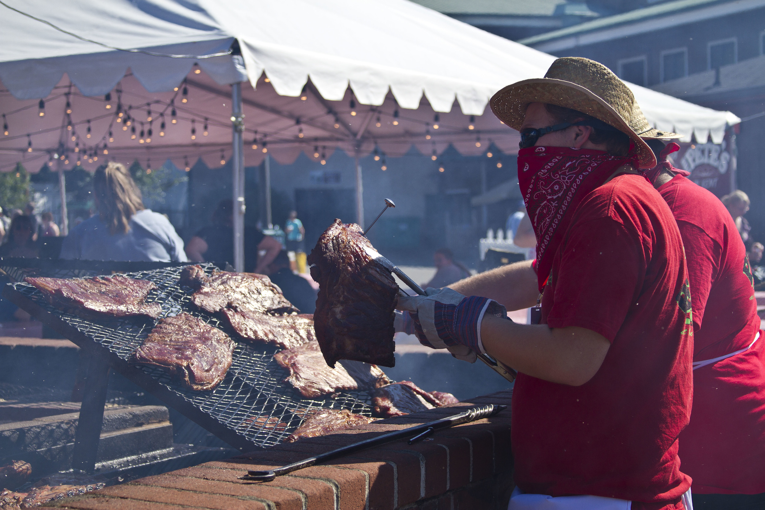  Vendors prepare BBQ and ribs at the 2014 Washington State Fair.&nbsp; 