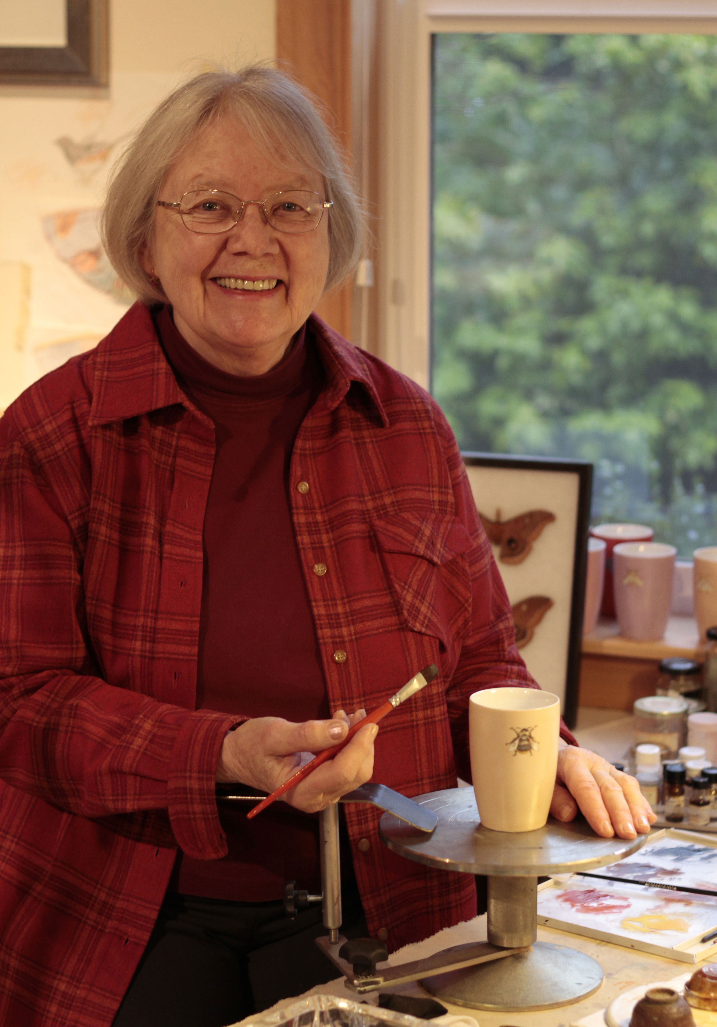  2016 Island Treasure Award recipient Cameron Snow in her home studio. Snow is most renowned for her work in the medium of film, through which she has immortalized many aspects of Bainbridge Island’s unique culture, heritage and environment. 