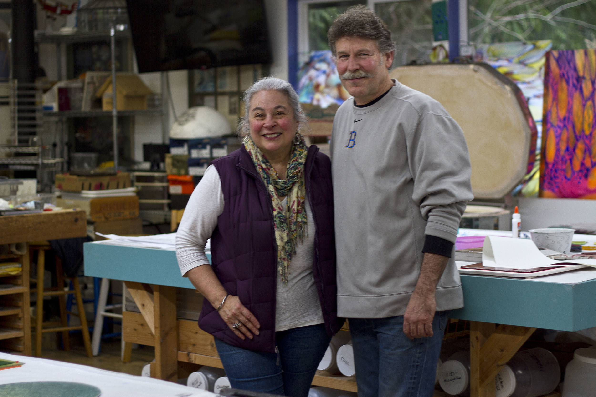  2015 Island Treasure Award recipients Diane Bonciolini and Gregg Mesmer of Mesolini Glass. Many of their pieces have become community staples on permanent display in prominent locales around Bainbridge Island, including the Waypoint park entrance in