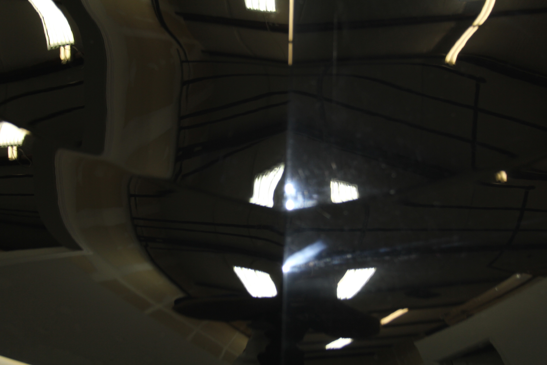 This picture show the left half of the hood after we finish correcting the paint vs the right hand side as delivered new from the dealer. Amazing difference in shine and clarity!