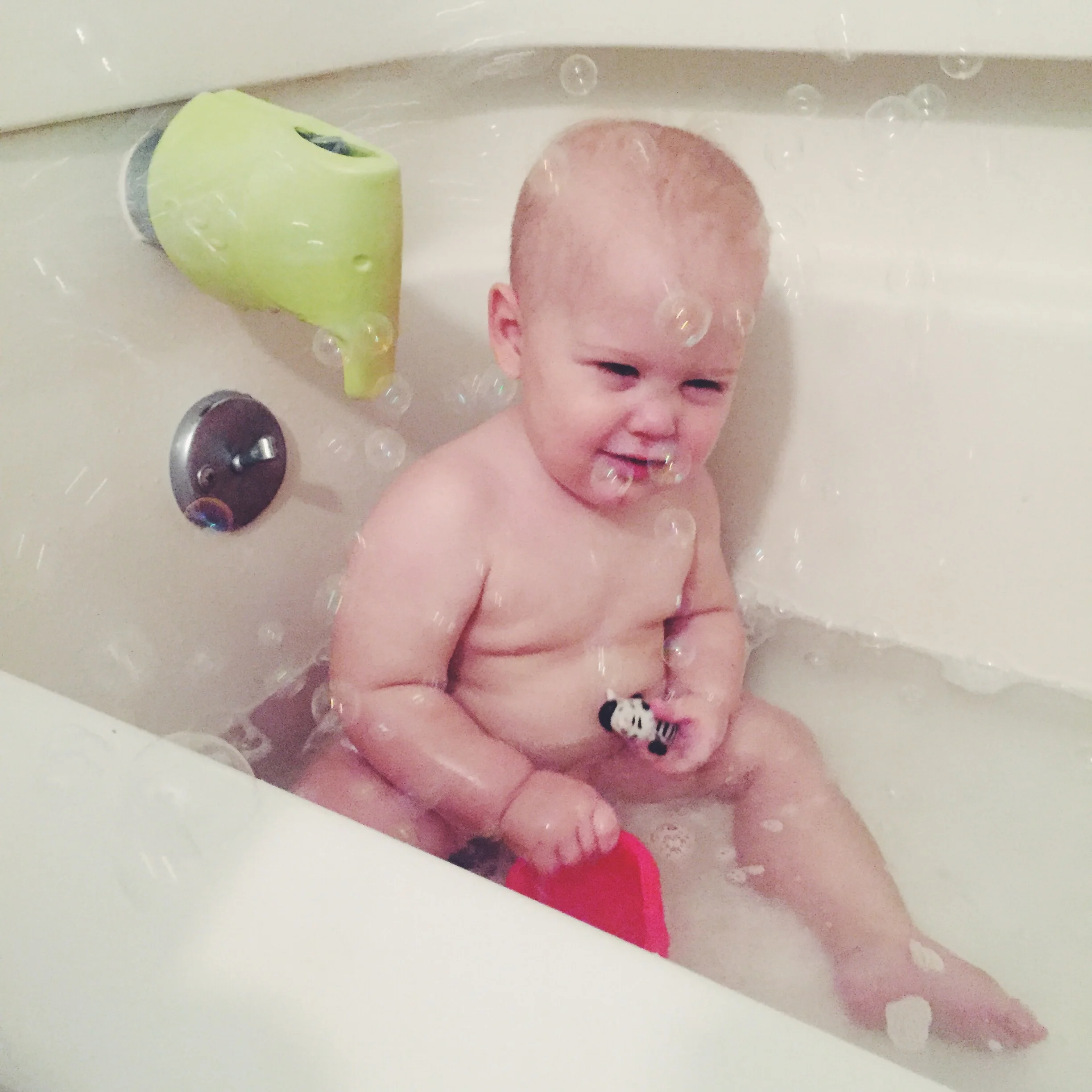 Noah isn't sure about his bubble toy.