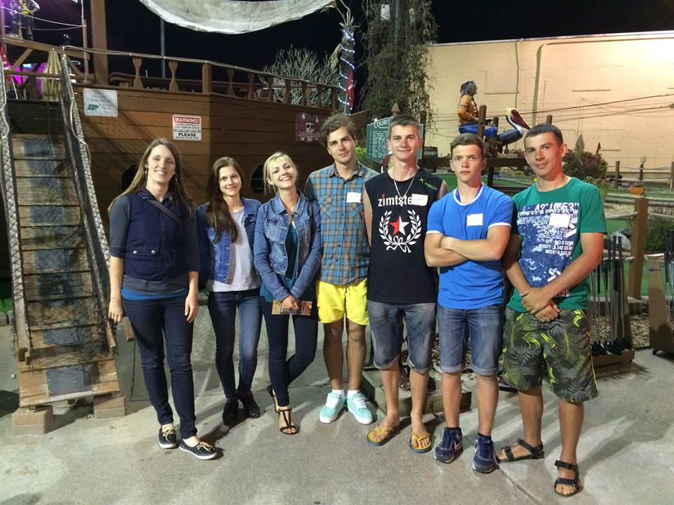 Ukrainian students in Virginia Beach took a night off to mini-golf with ERDT Work & Travel Program director Emily Reppun (at left).