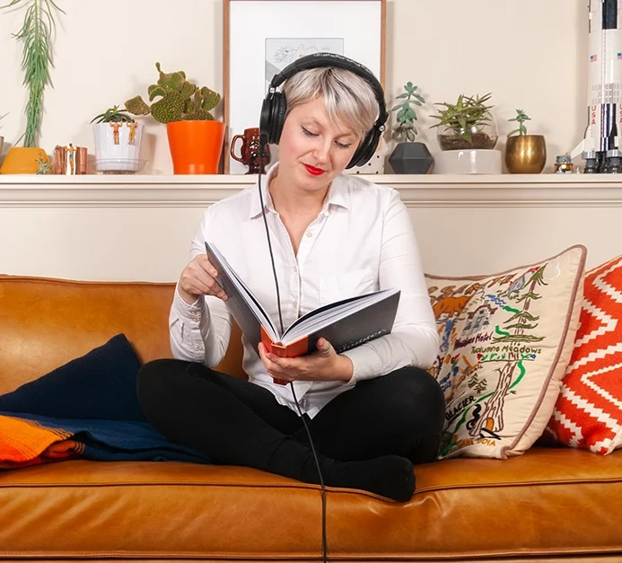 HEADPHONES+READING+COUCH.jpg
