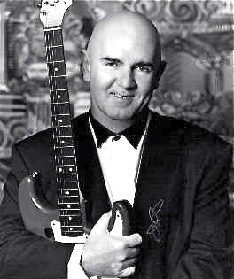 Denny-Leroux-with-guitar.jpeg