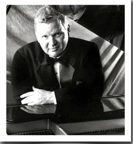 Jimmy at the piano with frame.jpg