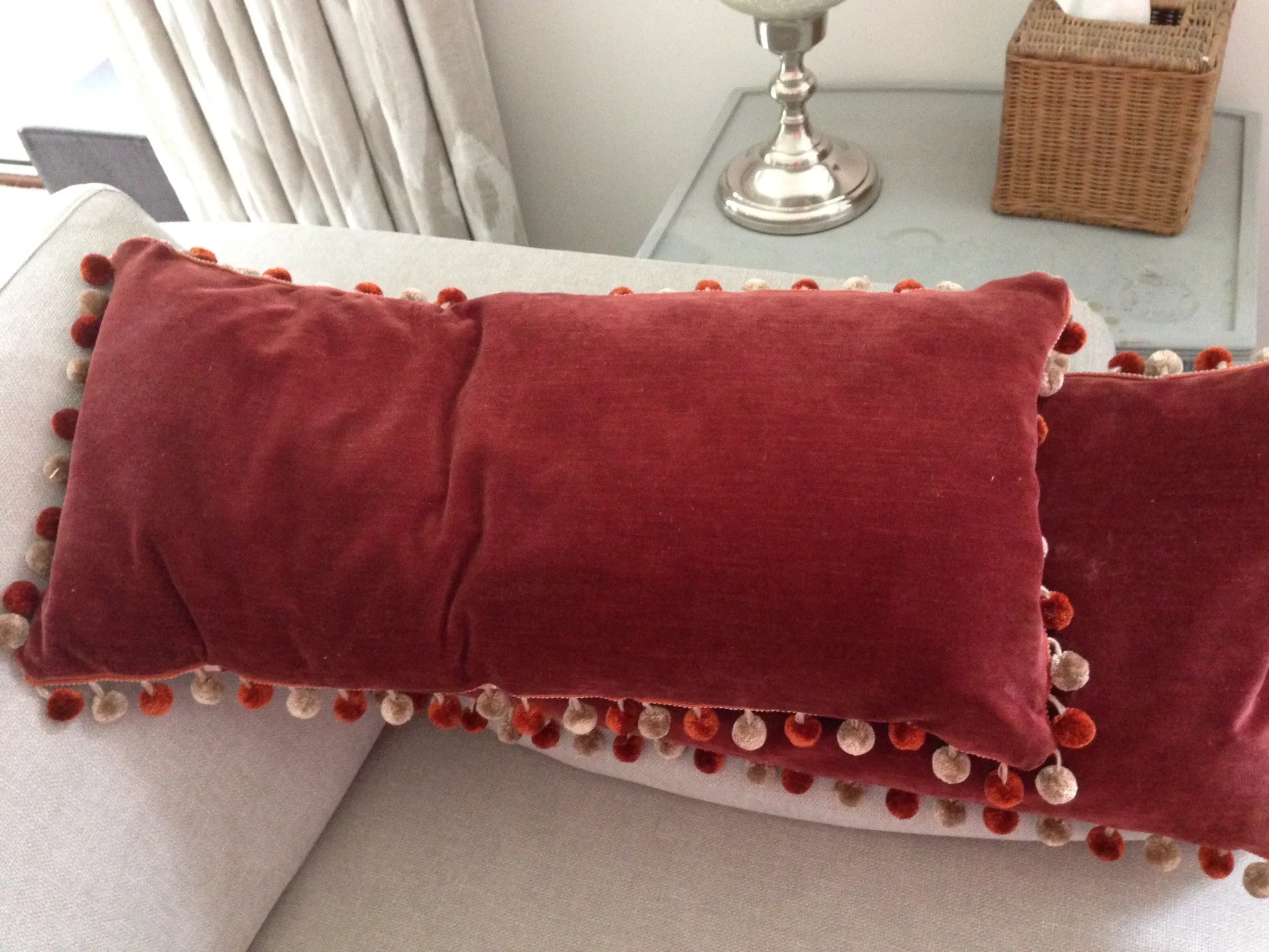 The orange velvet fabric and feather pads were re-cycled from a pair of old family heirloom cushions