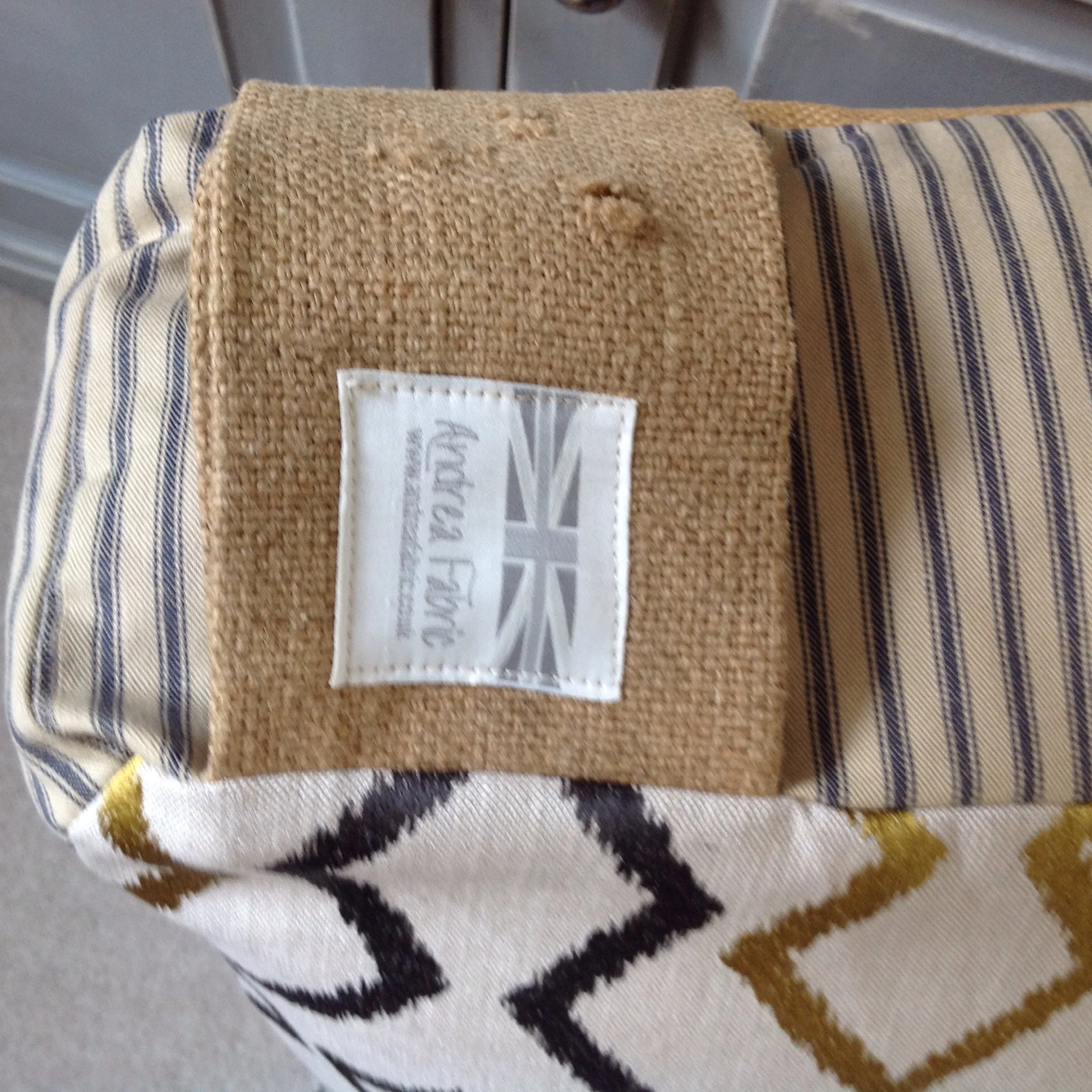 Handle with Andrea Fabric logo