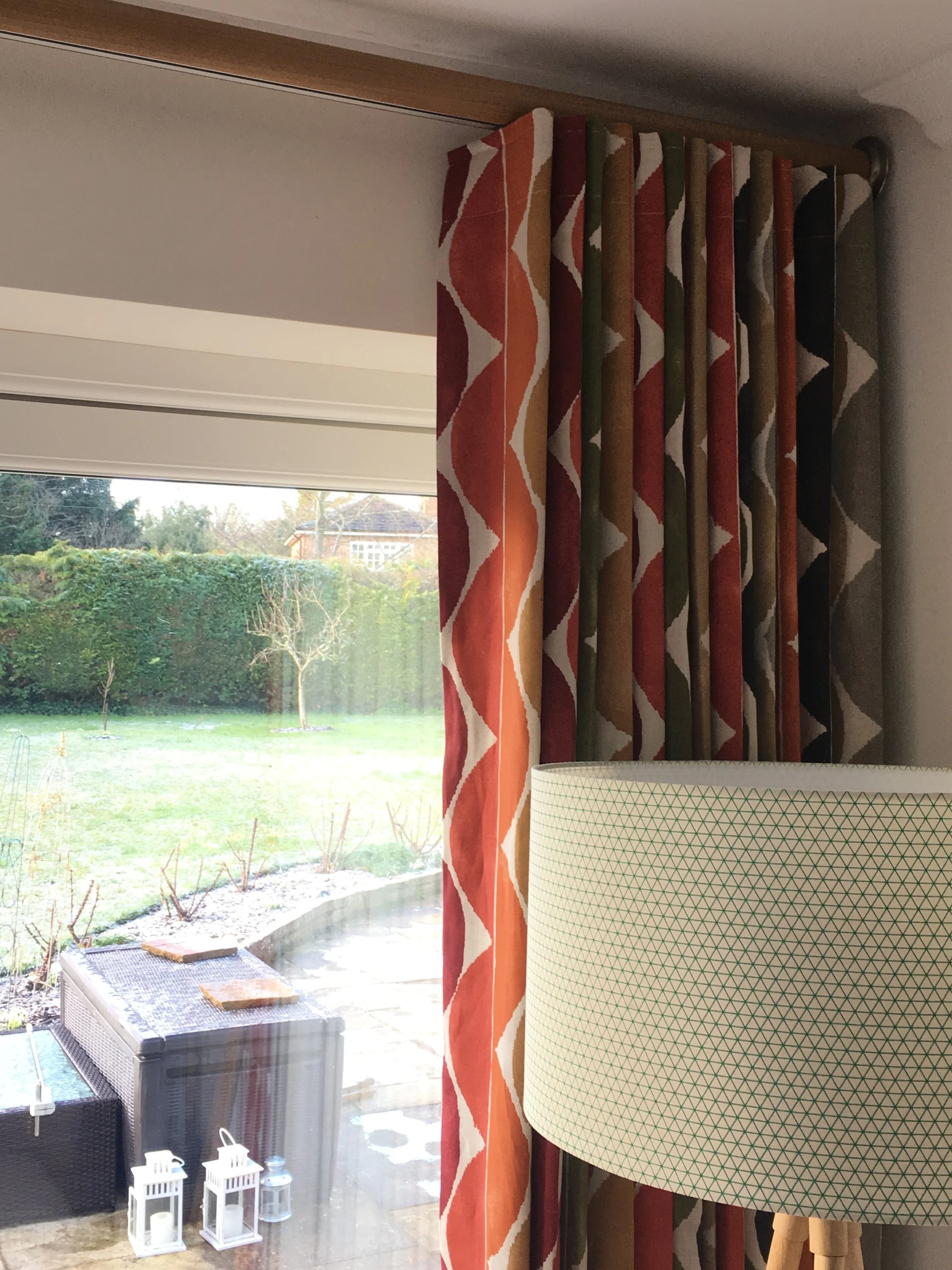 Wave headed curtains on a corded oak Walcot House pole