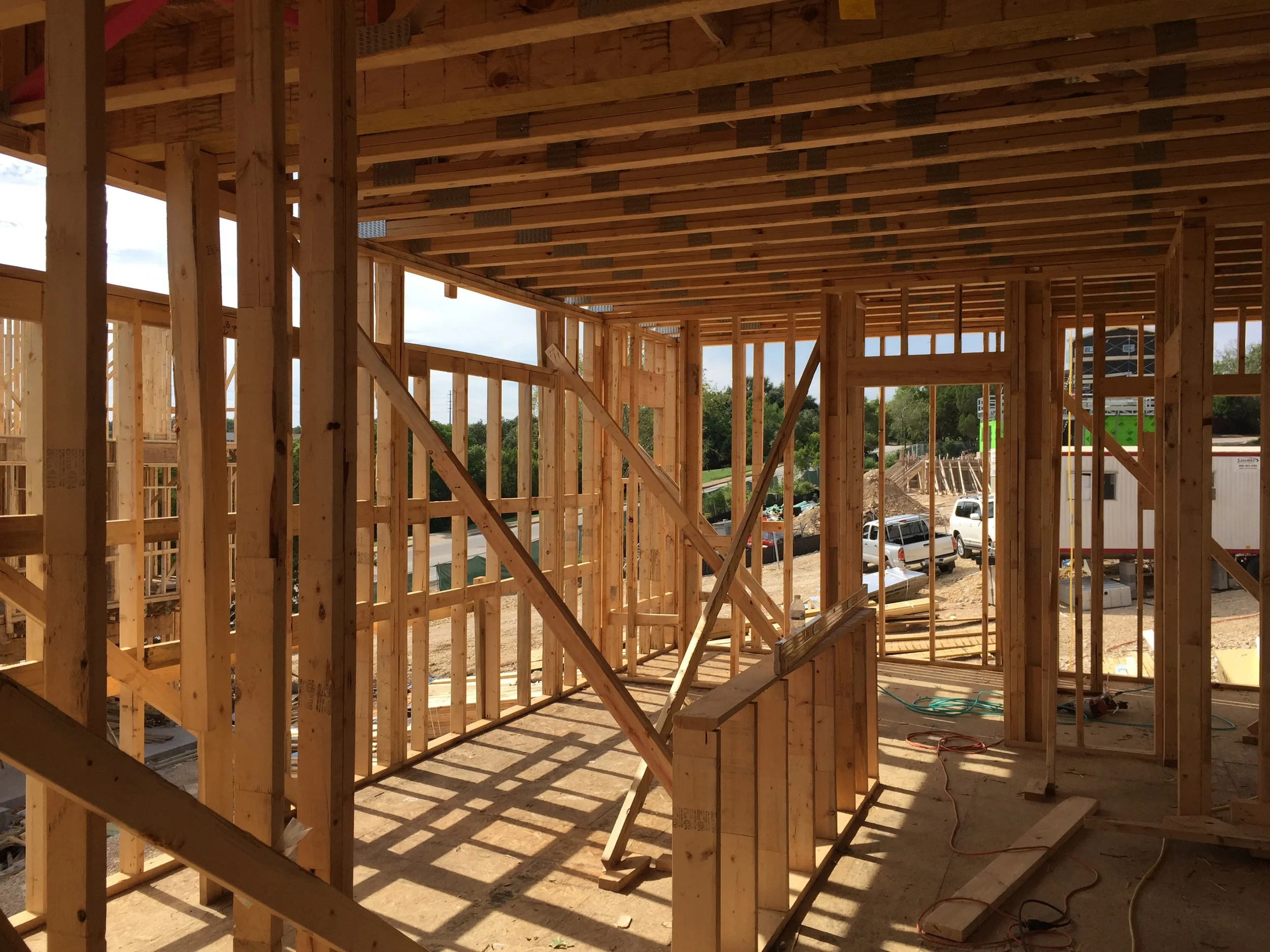 This is where Unit 12's kitchen will be- notice the clerestory windows that will be be above the cabinets. Out the "wall" to the far right you can see Unit 1 up the road.