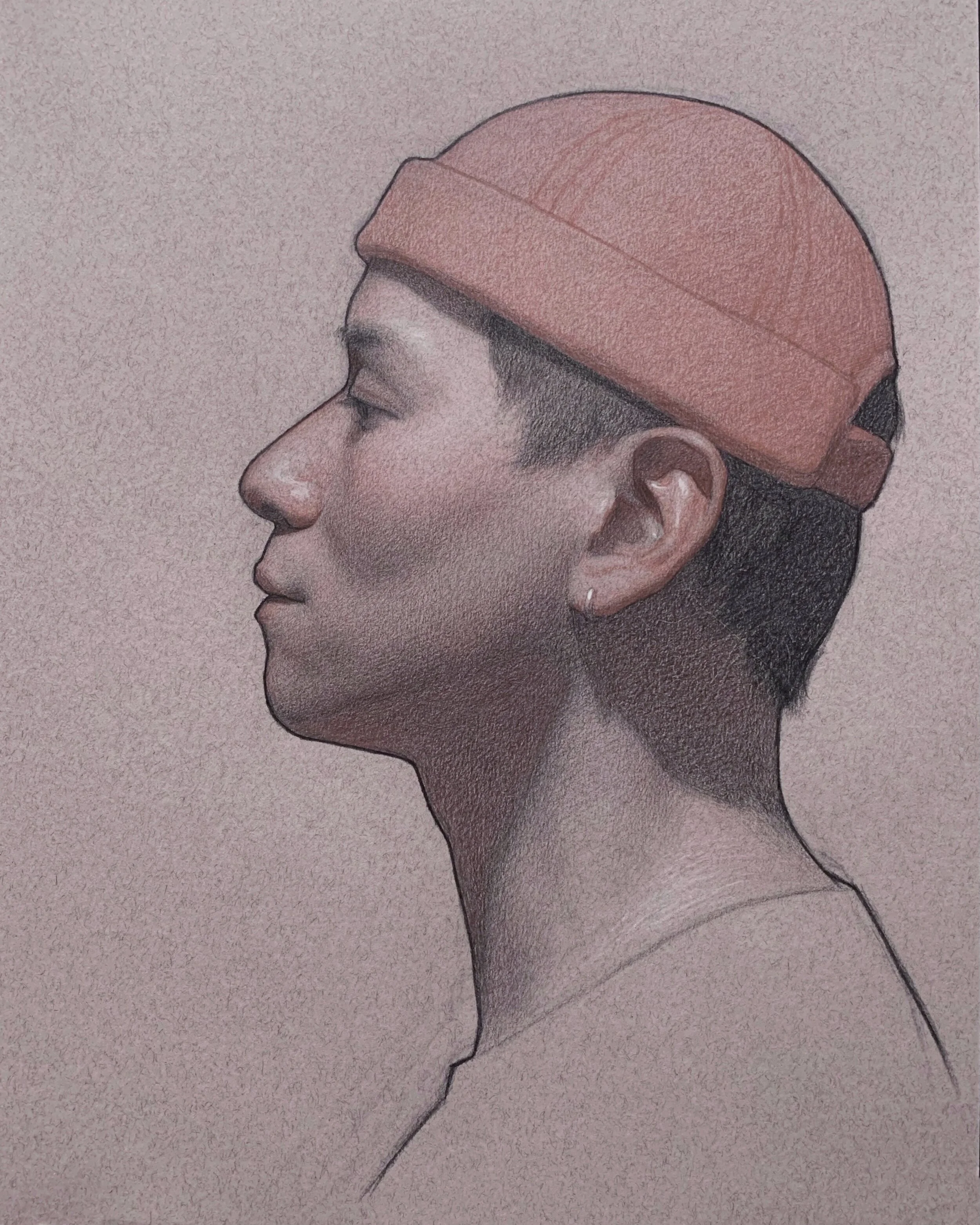   Self portrait in three colors,  red, black and white pencils on toned paper 