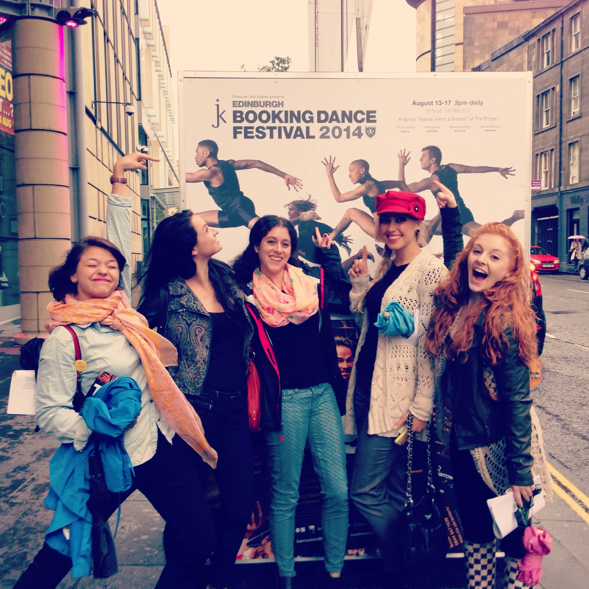 The girls in front of the EICC with the Booking Dance Festival poster!