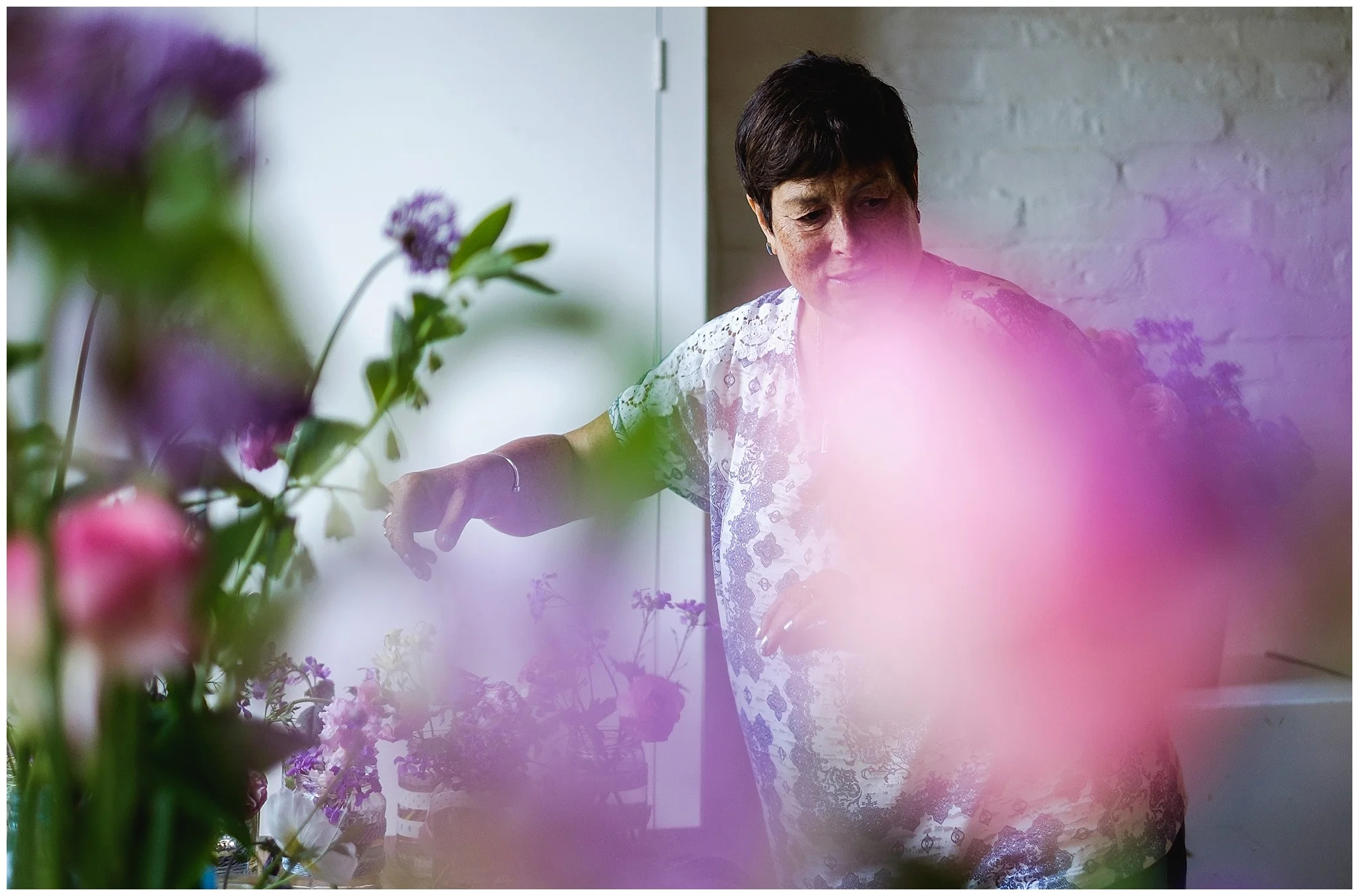 mum prepares wedding flowers