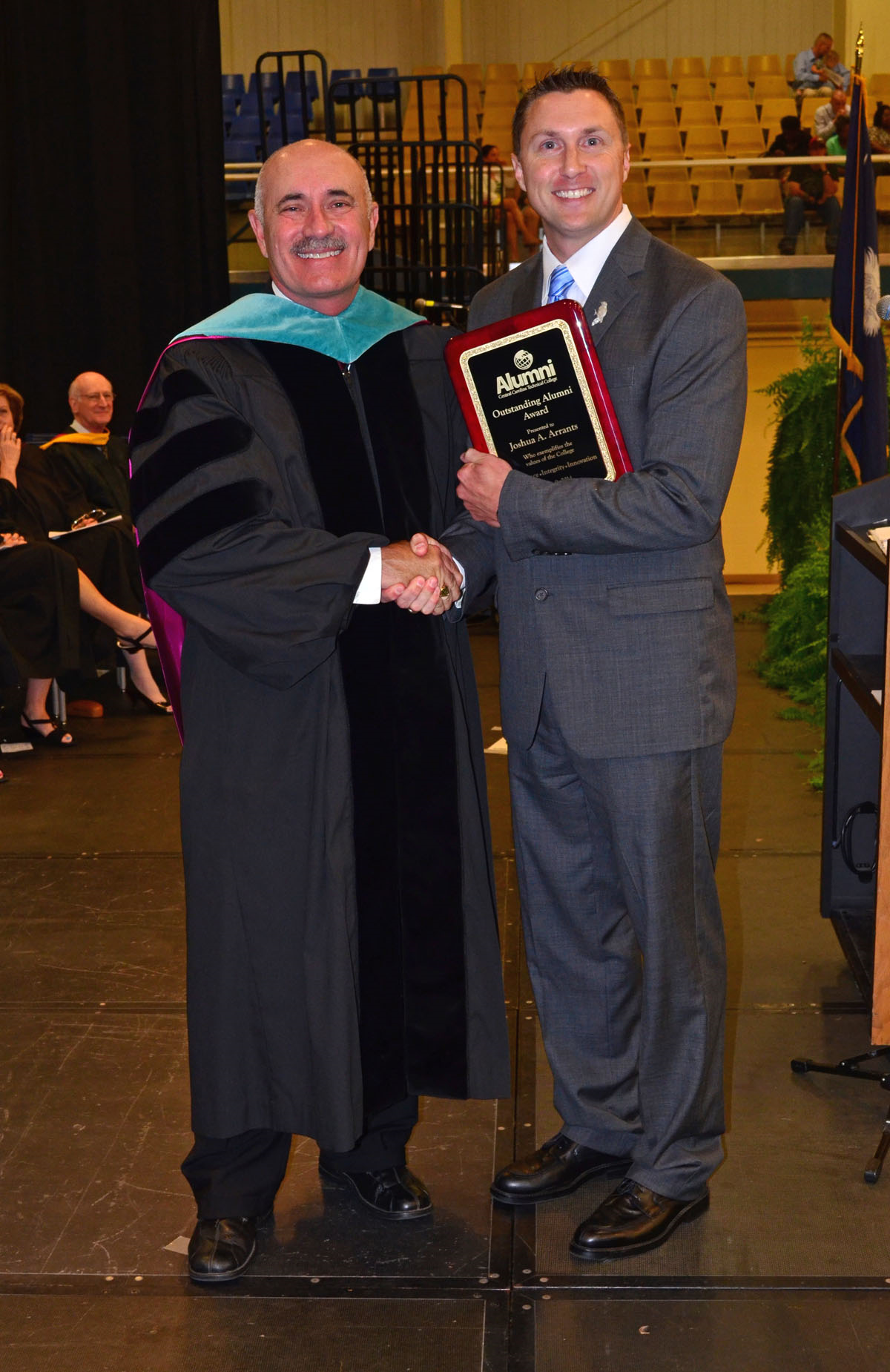 Dr. Tim Hardee presenting Outstanding Alumni Award. Photo courtesy Becky Rickenbaker
