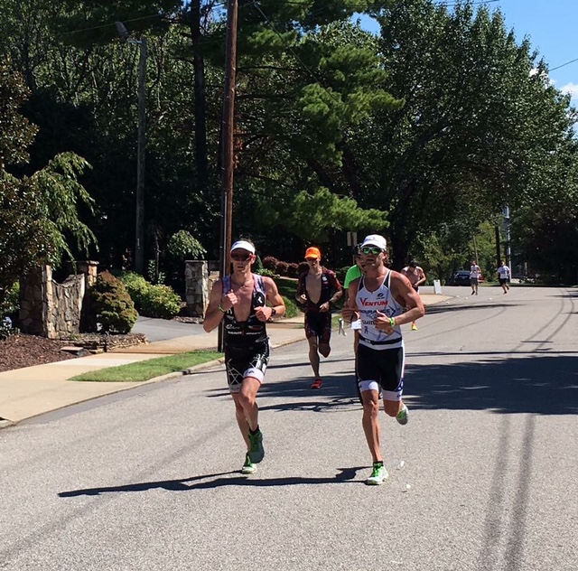 I promise there was a bike ride at some point, but I don't have any photos right now. In this shot, you can see Matt and I running together and just catching Eric Linkemann. You can also see Jeff Symmonds closing the gap just behind him. At this moment, spots 3-6 were only a few seconds apart. I believe this was mile 9.