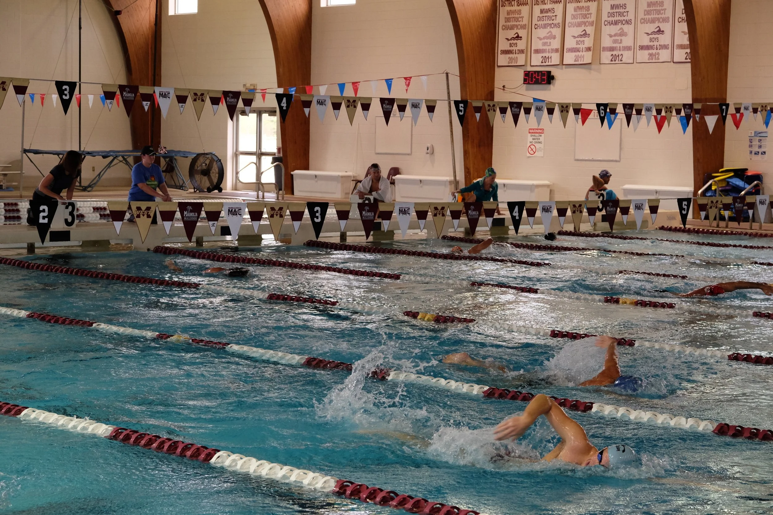 About 200 yards into the 500 (blue cap)