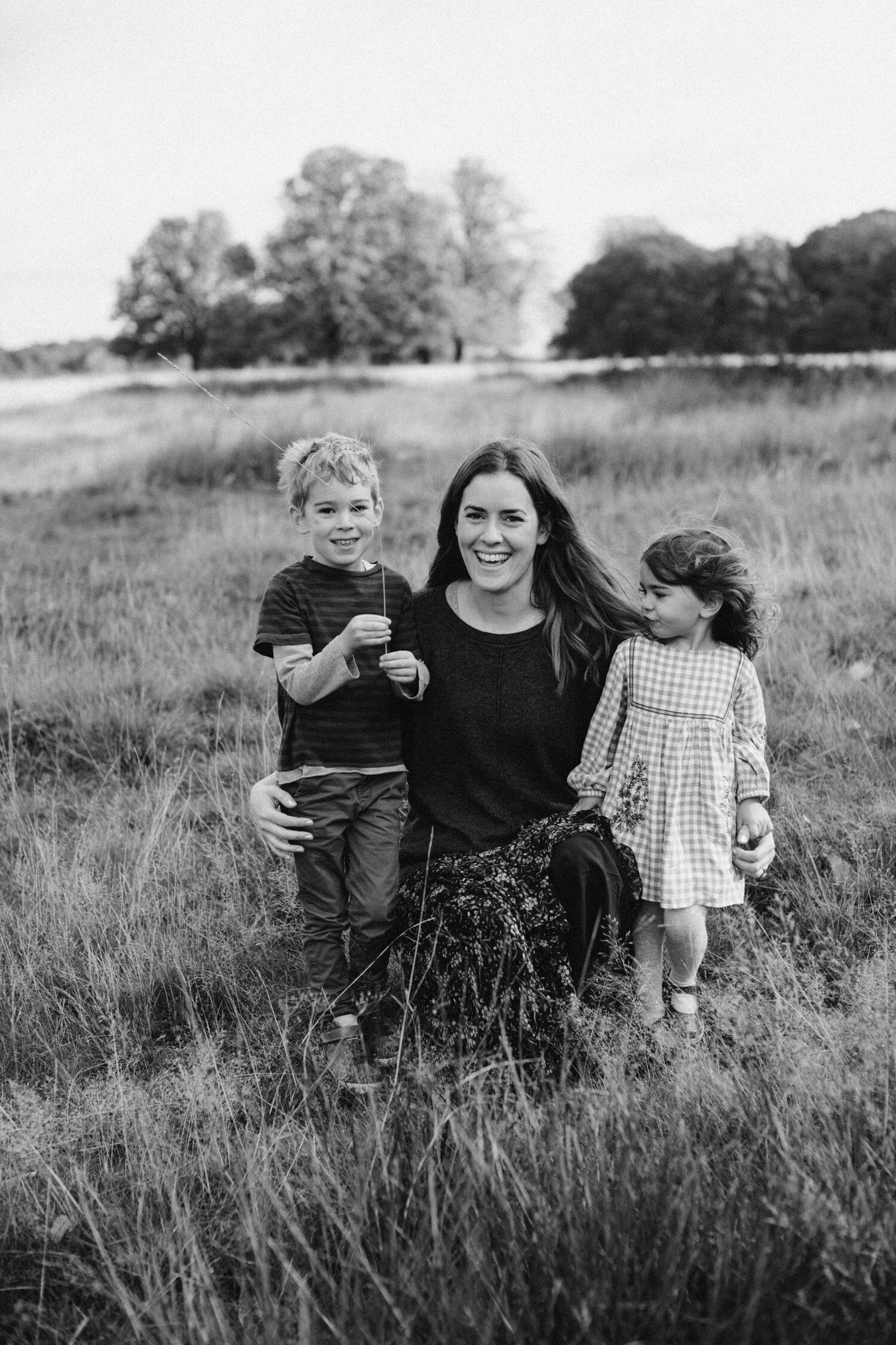 portrait of a mother with children in richmond park