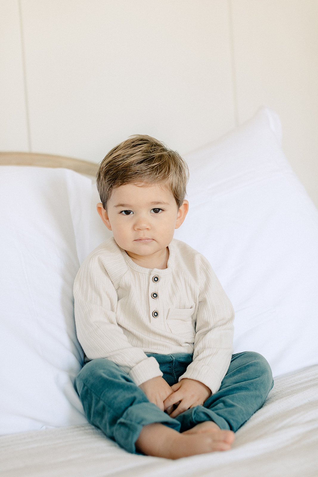  tunbridge wells family photographer toddler on bed 