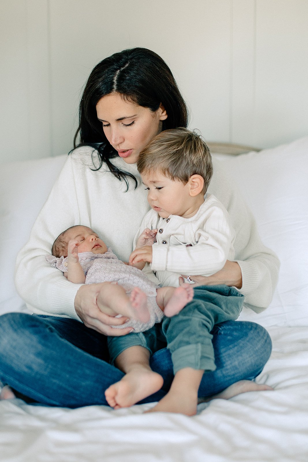  tunbridge wells newborn photography mother and two children cuddling 