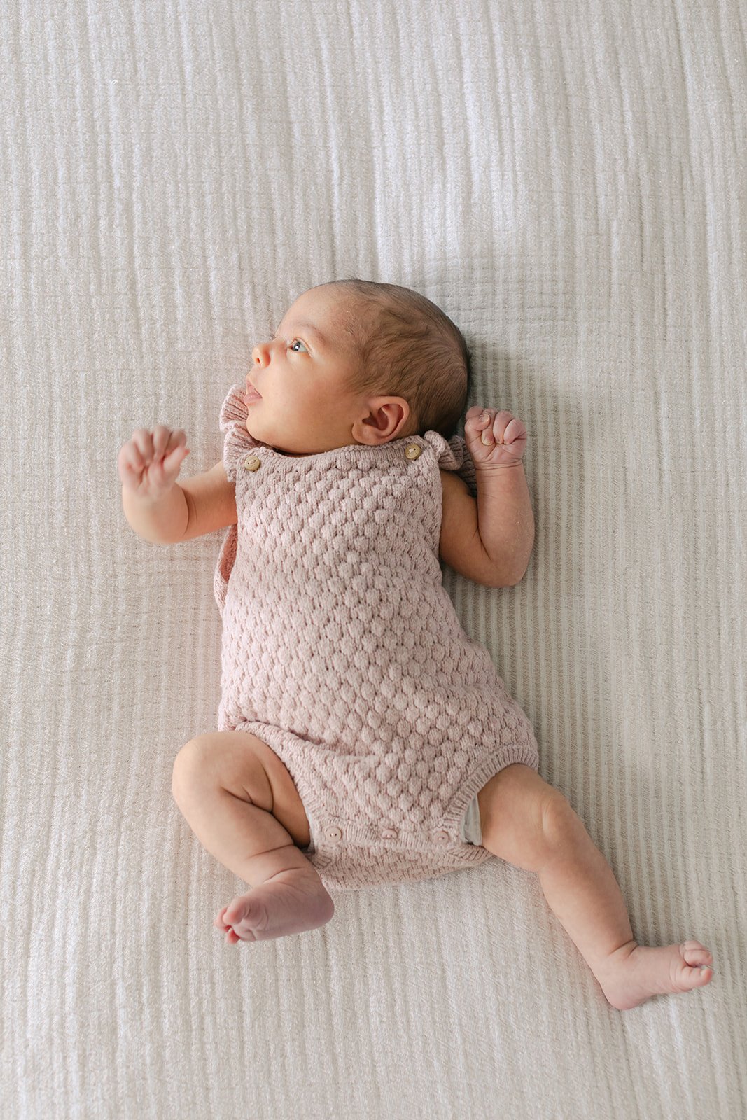  newborn photoshoot baby on a bed in tunbridge wells 