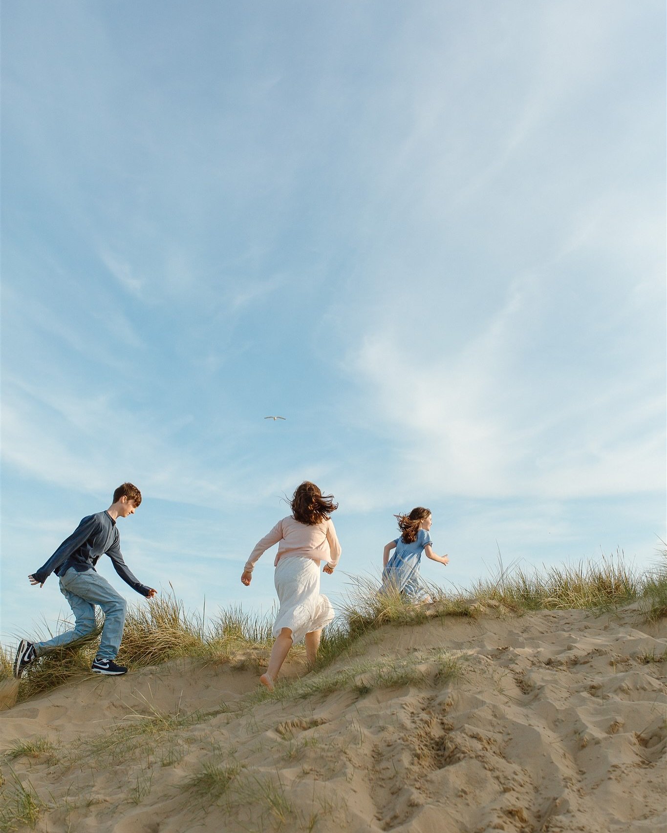 There&rsquo;s something so special about capturing kids candidly. It&rsquo;s not often I get to photograph older ones but when I do it&rsquo;s such fun. Here&rsquo;s a little collection from a windy golden hour shoot with a family I&rsquo;ve document
