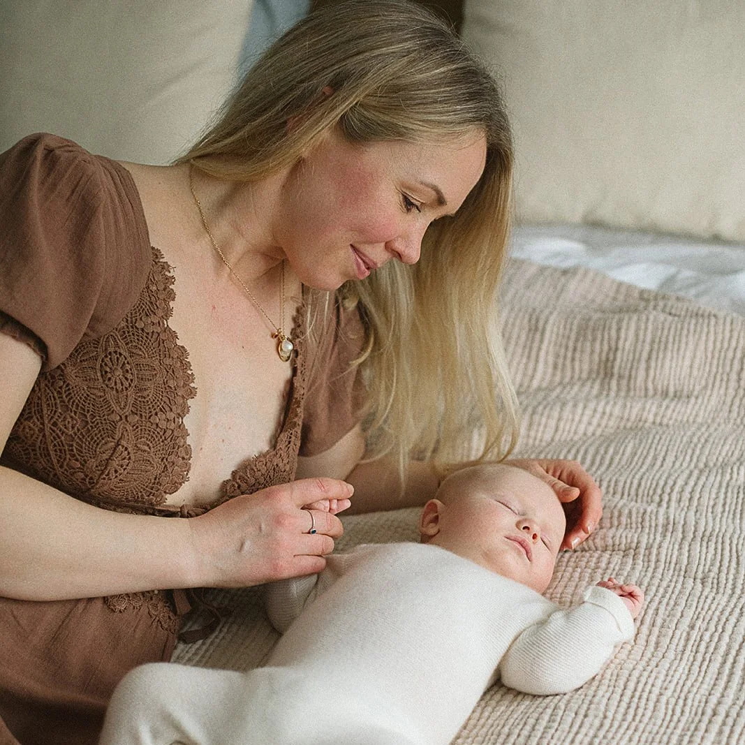newborn-photographer-tunbridge-wells-mother-gazing-at-newborn.jpg