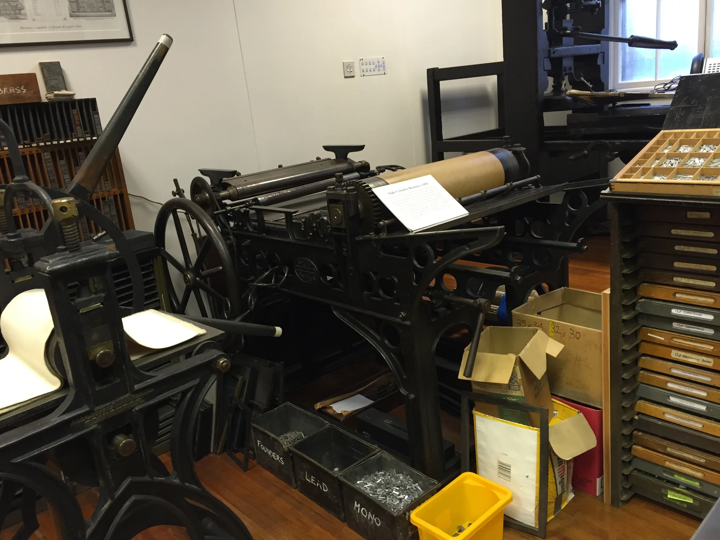 In the basement were loads of type and machines. 