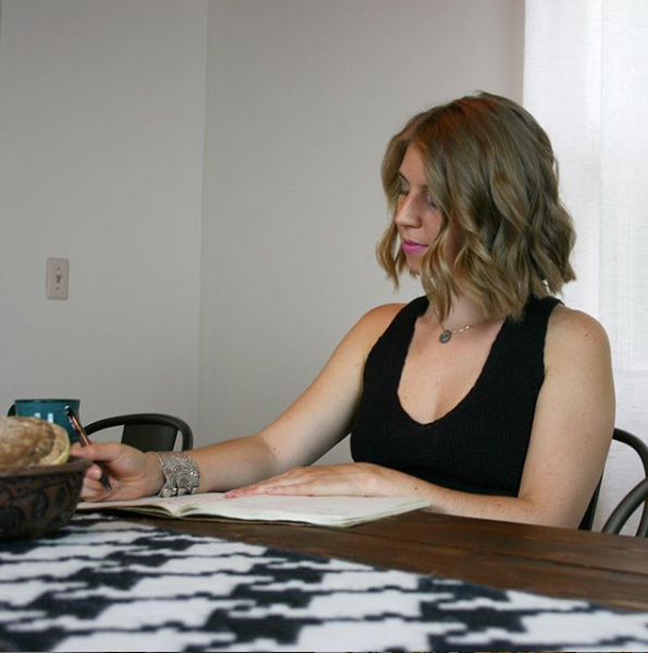 Jillian at Dining Room table Writing 2018 .png