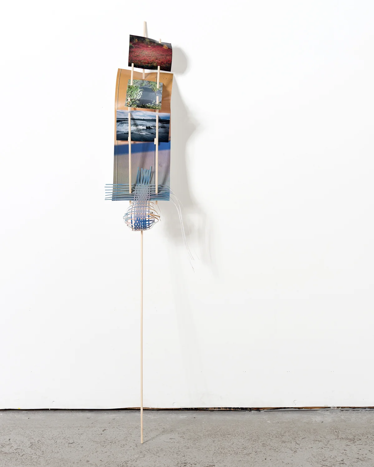   Breezy-outer-edge-falls , 2014  cut-up inkjet prints and wooden dowels  48 x 10 x 13 inches   Twist-flip-tremble-trace , Johalla Projects, Chicago, IL   