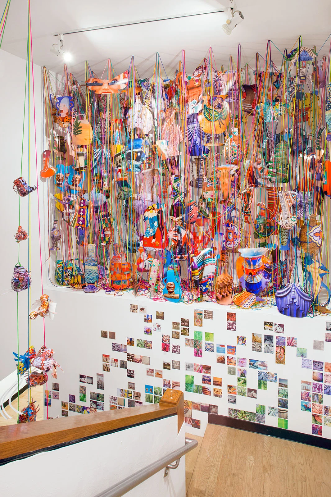   Collecting Within , 2016  cut-up inkjet prints, paracord, mason line, wooden dowels, miniature clothespins, party lights  dimensions variable   MoCP at 40 , Museum of Contemporary Photography, Chicago, IL 