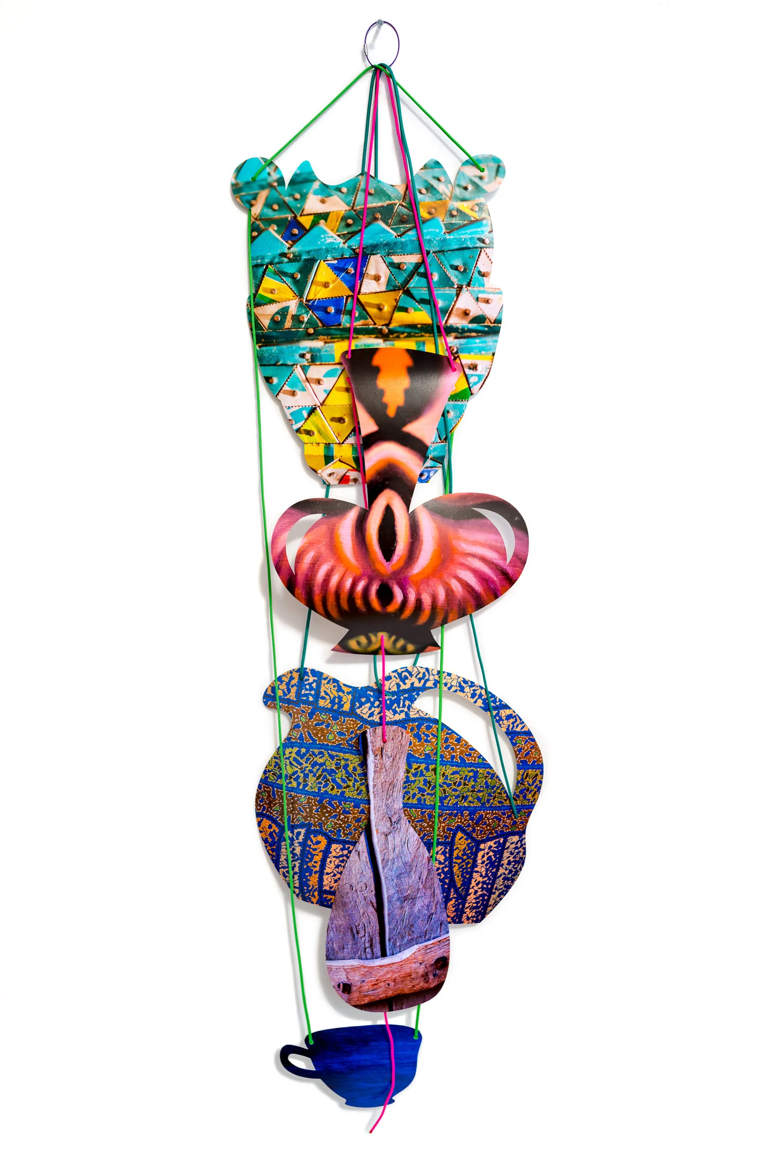  Rejoining Roger Brown:  Virtual Still Life: Service with a Smile , 2016  cut-up inkjet prints, paracord, cable rings  dimensions variable 